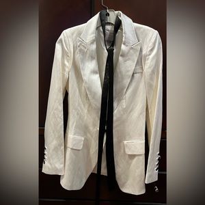 White satin shiny fitted jacket with black accents